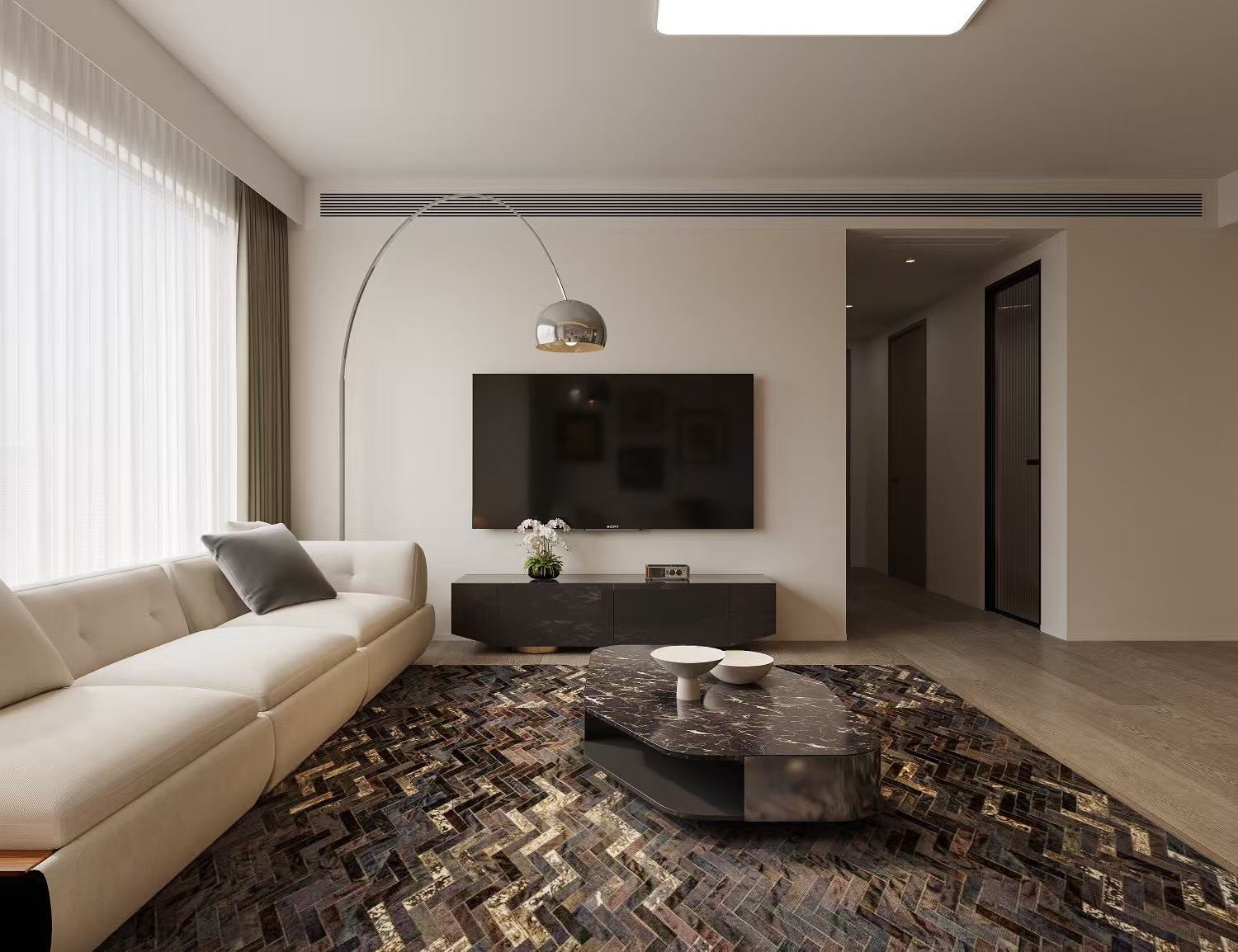 Coin TV du Projet Horizon, lampe arc chromée et tapis en chevrons