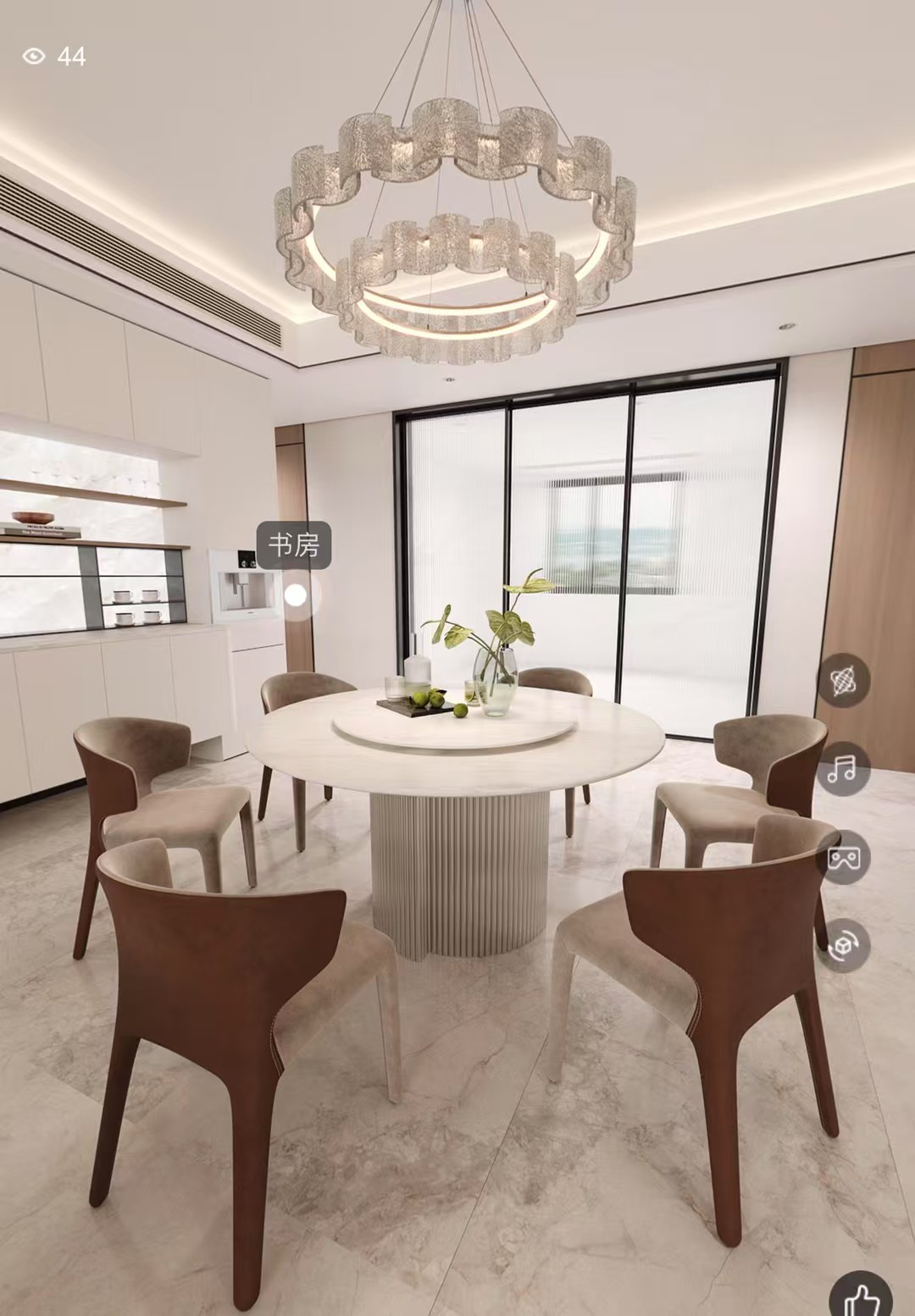 Salle à manger du Projet Signature, table ronde cannelée et chaises cuir cognac